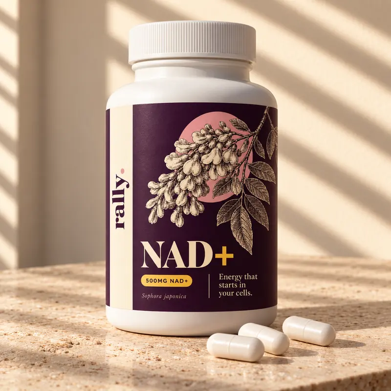 Rally NAD+ bottle in window light with three white capsules beside it