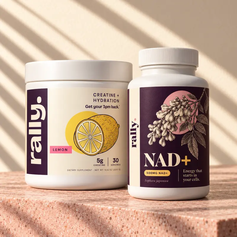 The Rally Stack: lemon Creatine Hydration tub and NAD+ bottle side by side in morning sun